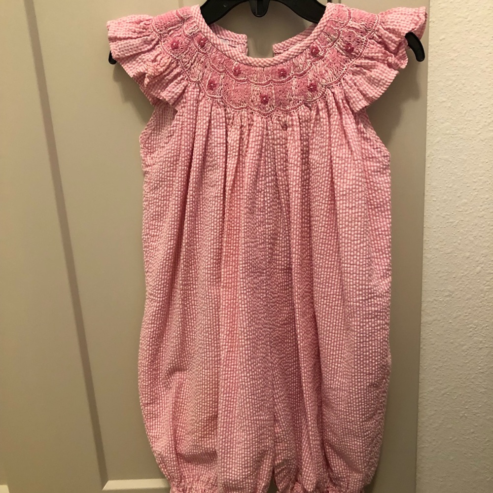 Pink seersucker smocked bubble romper